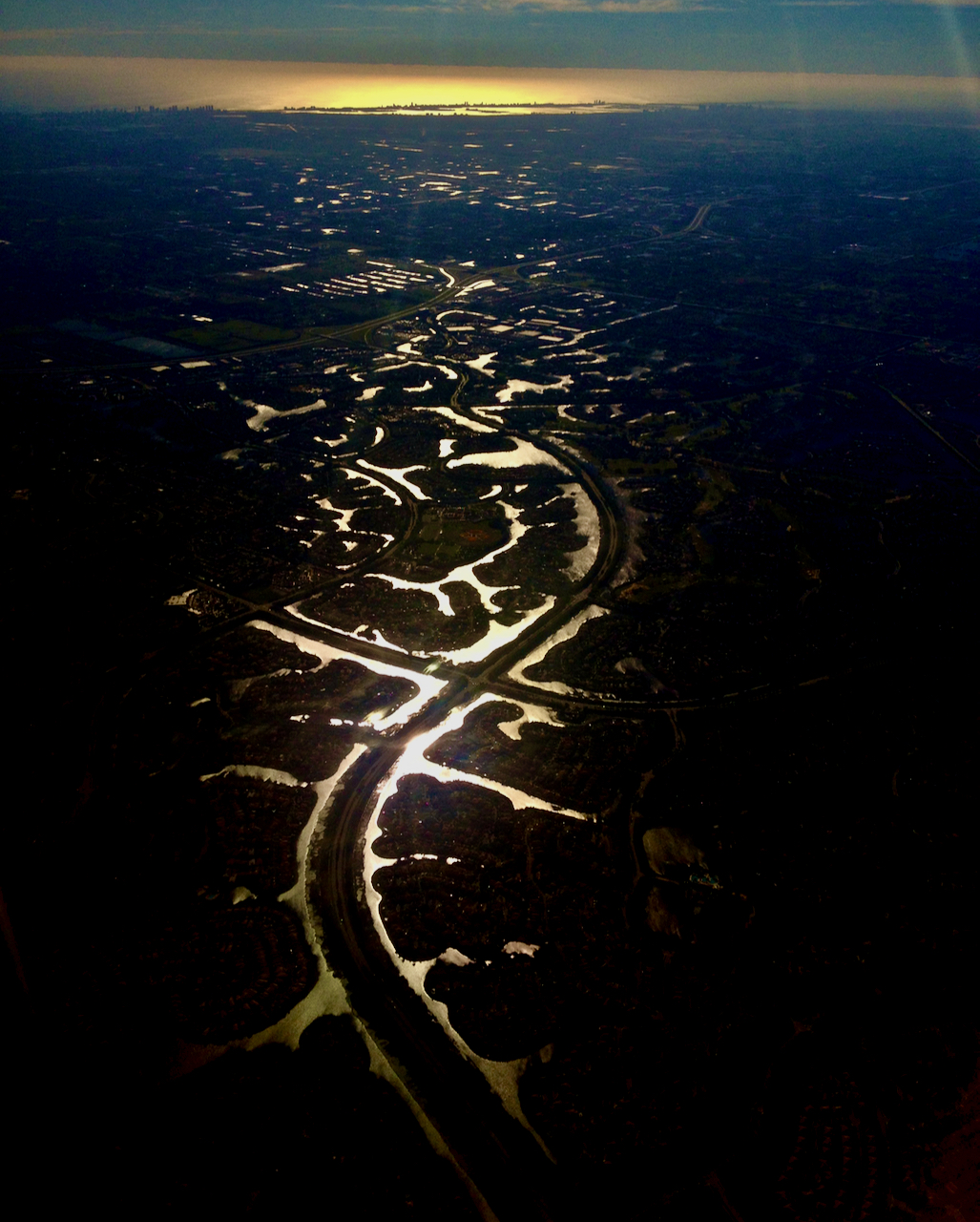 Picture of canals in Florida as the sun is rising.