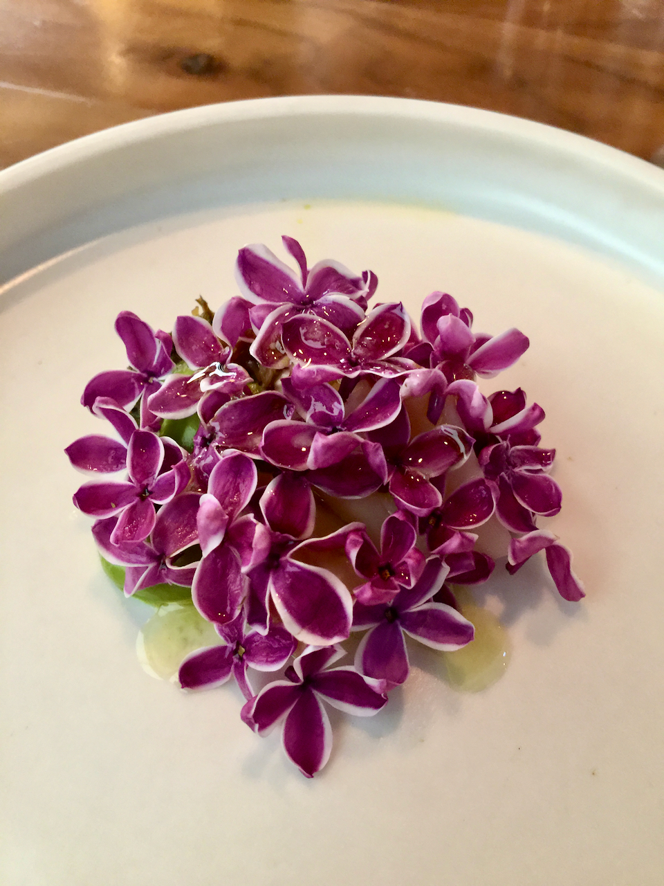 Lilacs were served as an appetizer at a fancy restaurant.