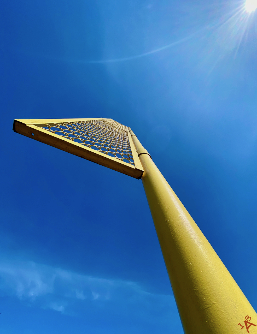 Picture of a foul pole looking up.
